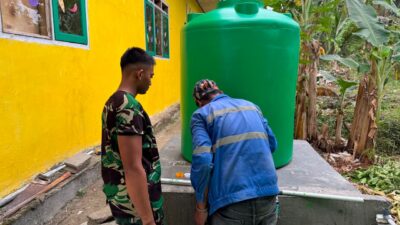 Program Manunggal Air Bersih di SDN Umbele Masuki Tahap Pengecatan Tandon Air