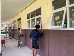 Satgas TMMD Bersama Masyarakat Laksanakan Pengecatan SDN Polewali